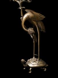 Three Chinese Bronze 'Turtle and Crane' Candle Holders