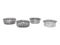 A Pair of George IV Silver Wine Bottle Coasters