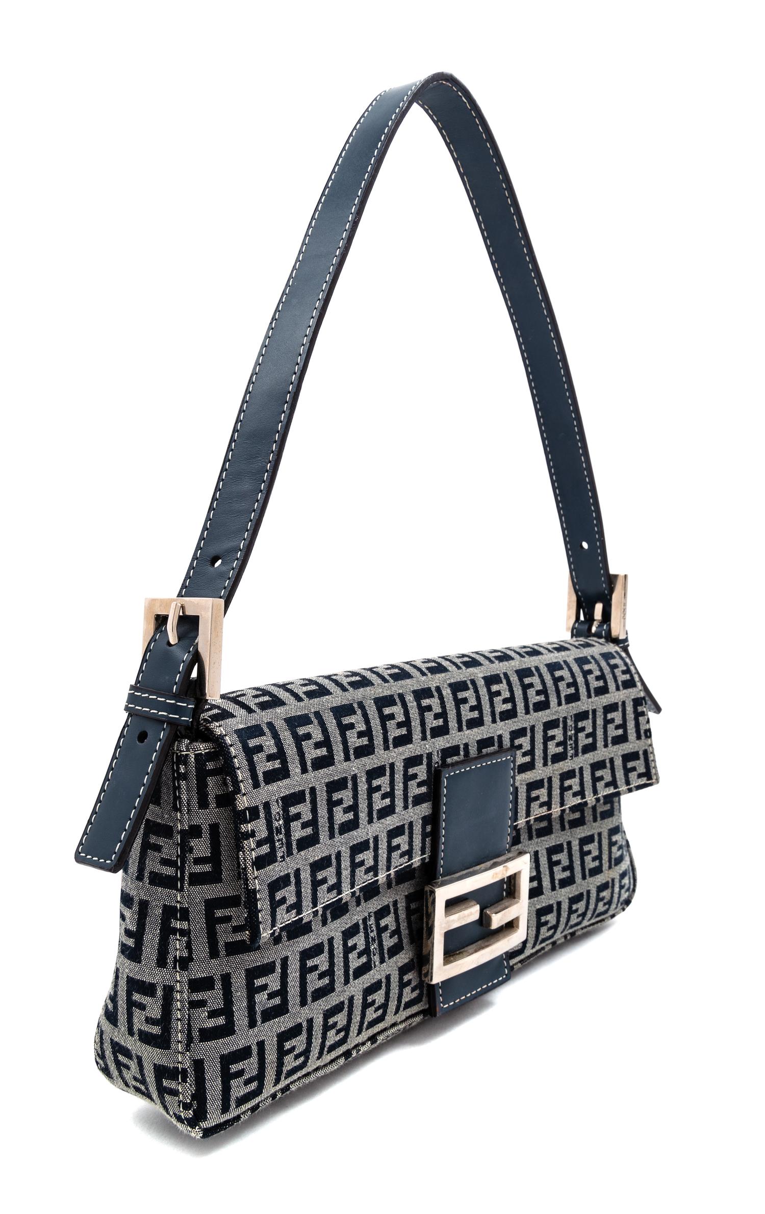 A Fendi Navy Monogram Canvas Zucca Baguette, 5" H x 10.25" W x 1.75" D; Strap drop: 6.5"- 9.5".