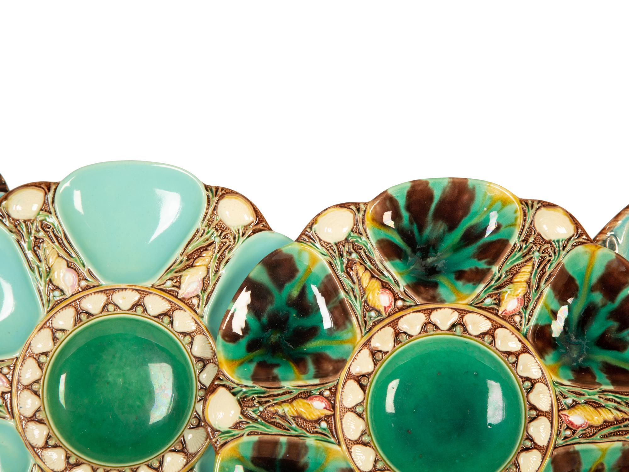 A Group of Eight English and French Majolica Six-Well Oyster Plates — Mid-19th Century