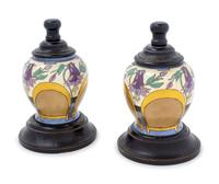 A Pair of Longwy Gilt Metal Mounted Ceramic Candlesticks