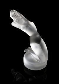 A Lalique Molded and Frosted Glass Figure, Height 5 3/4 inches.