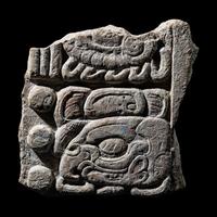 A Maya Limestone Fragment with Glyphs
