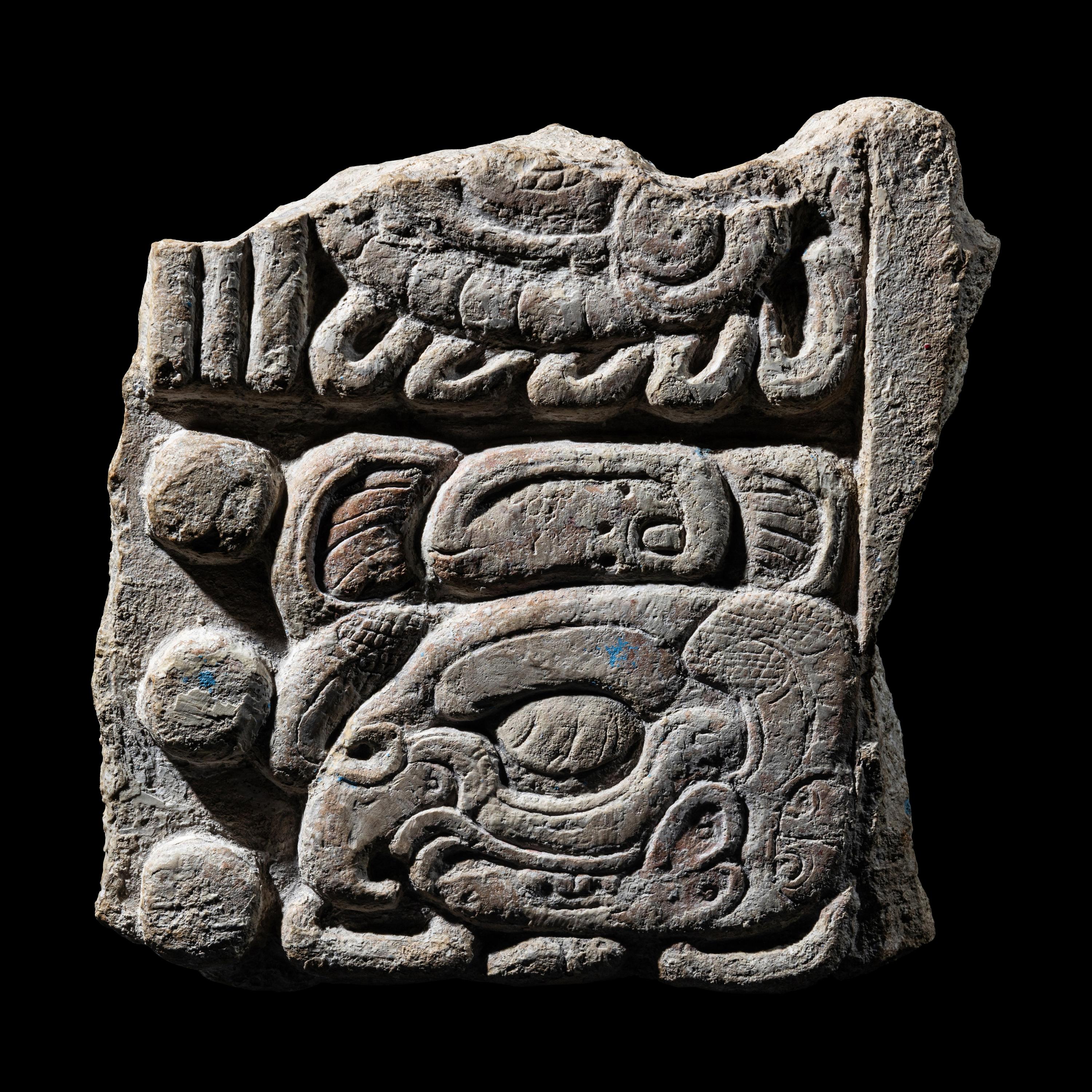 A Maya Limestone Fragment with Glyphs
