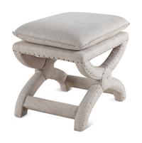 A Contemporary Linen-Upholstered X-Form Stool
