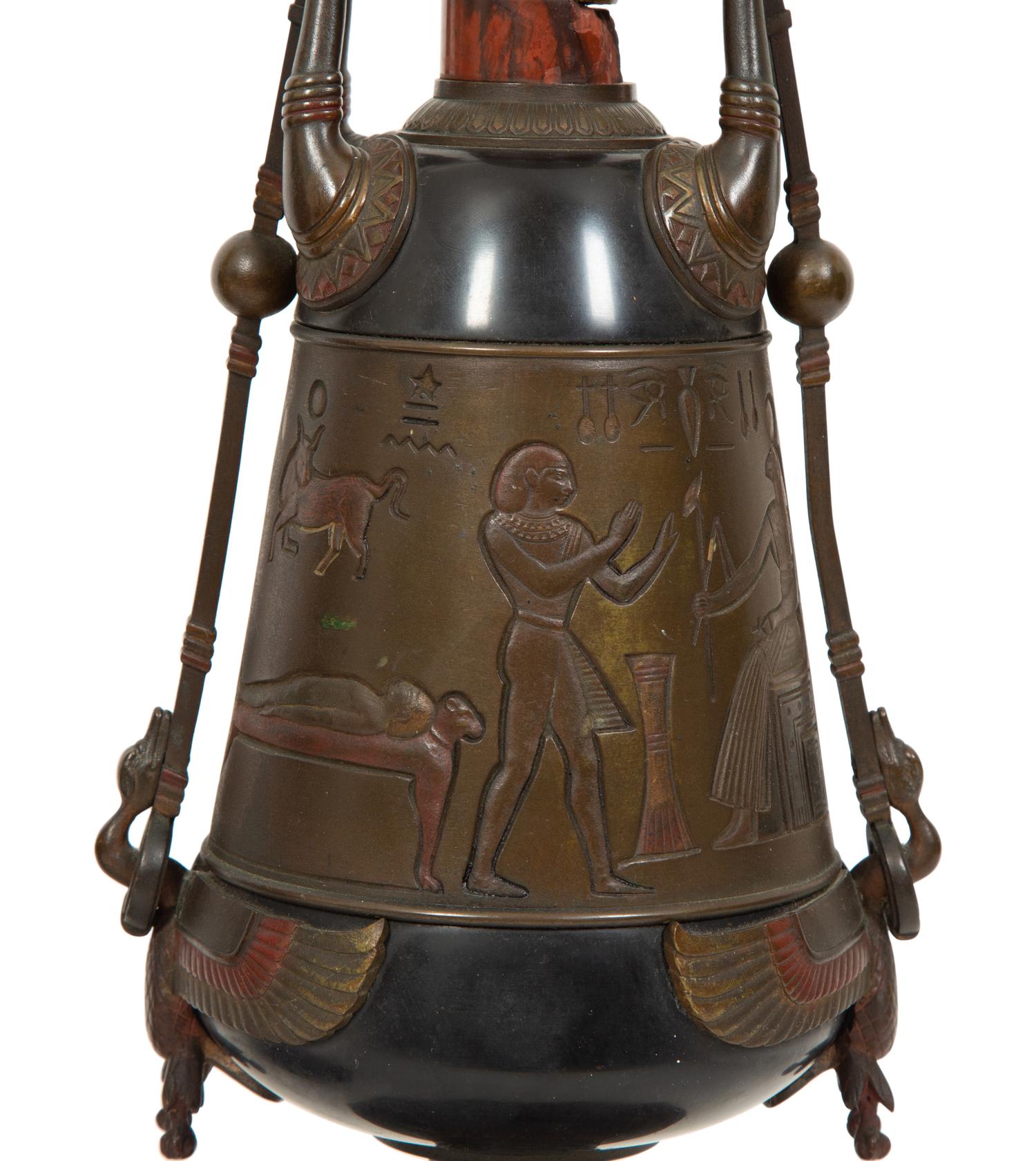 A Pair of French Egyptian Revival Bronze and Marble Urns
