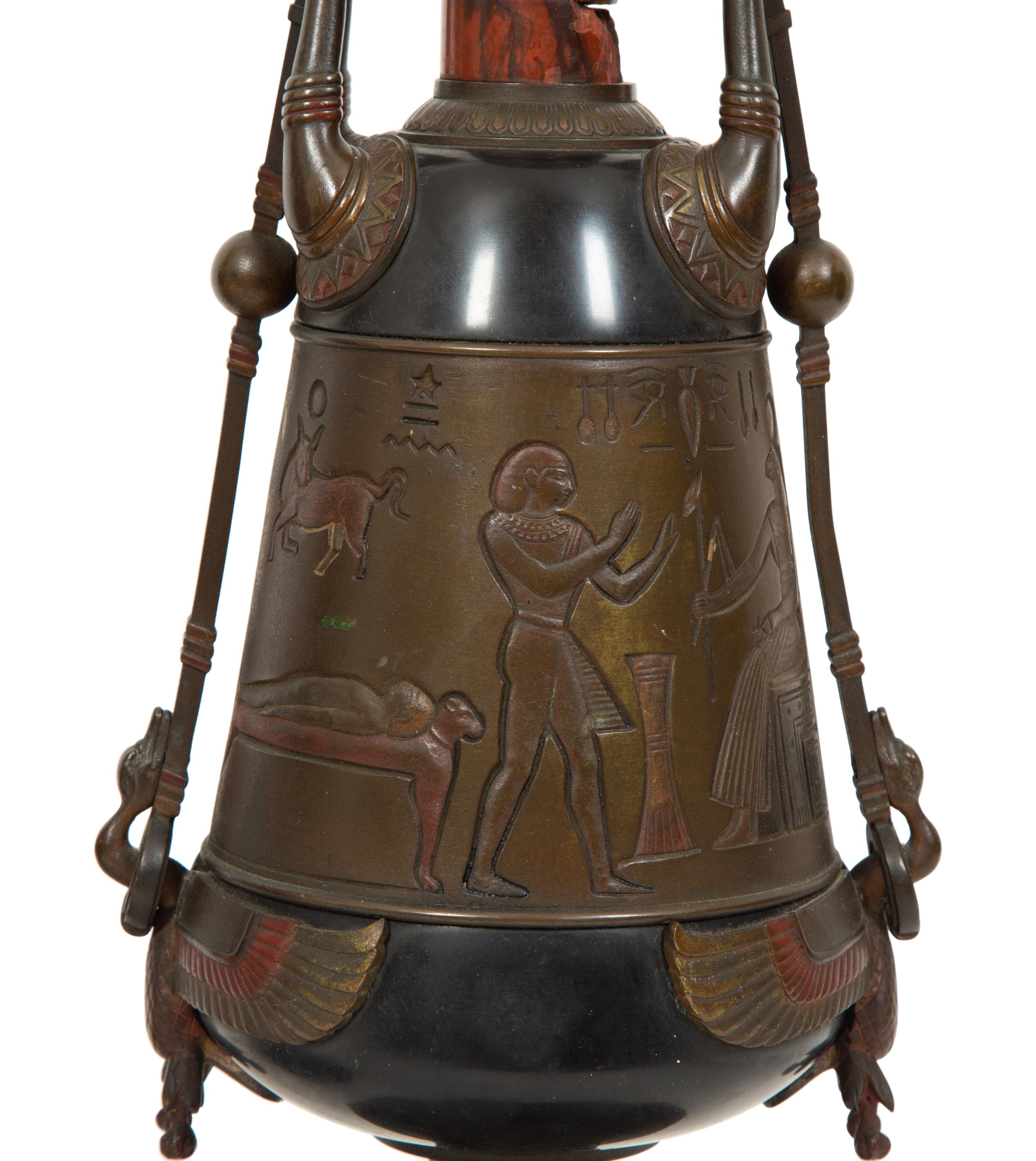 A Pair of French Egyptian Revival Bronze and Marble Urns