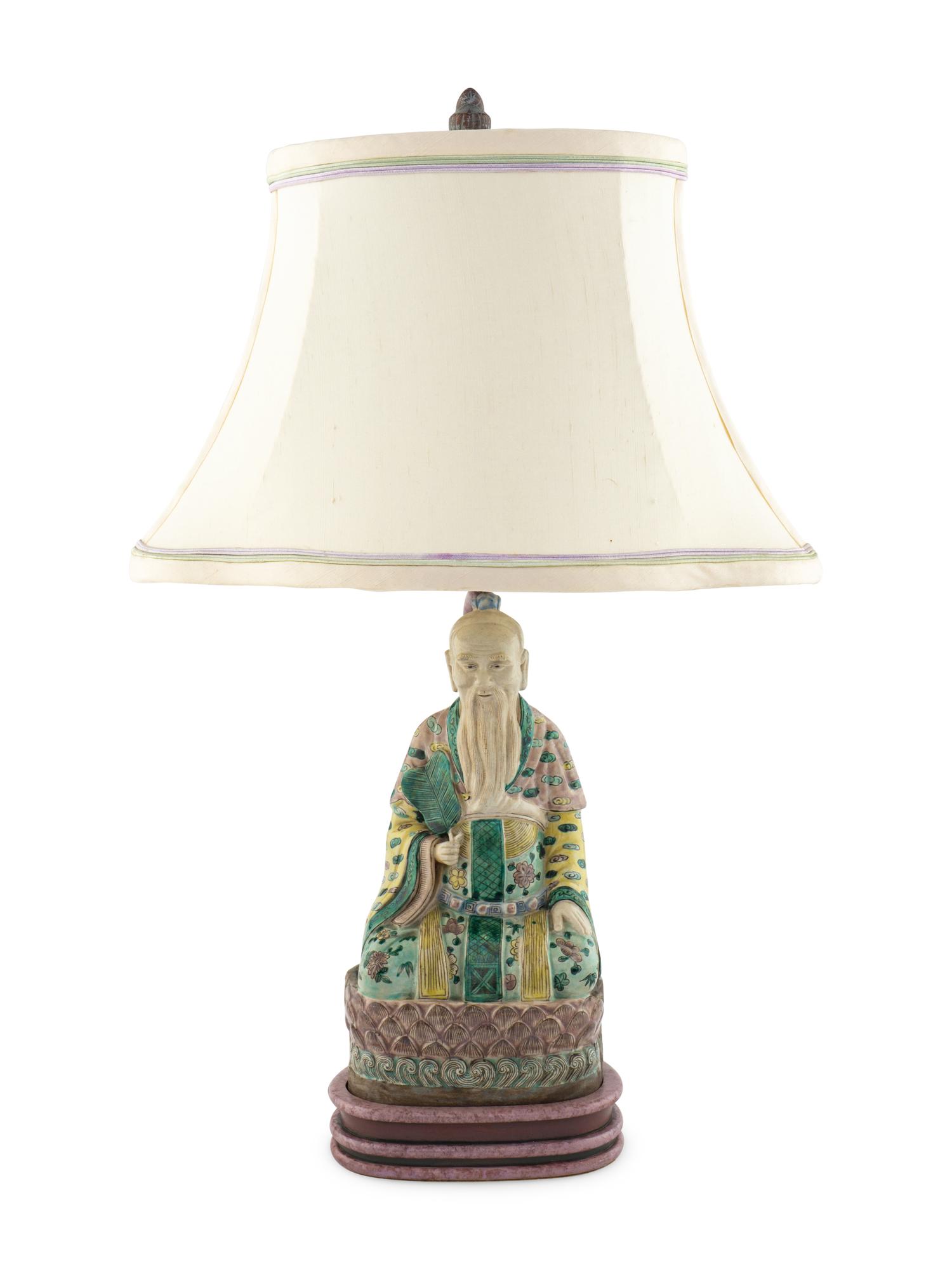 A Chinese Porcelain Figure of an Immortal