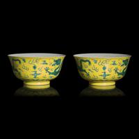 A Pair of Chinese Green Enameled Yellow Ground 'Dragon' Bowls, Guangxu Mark and of the Period — 清光緒 黃地綠彩雲龍紋碗一對
