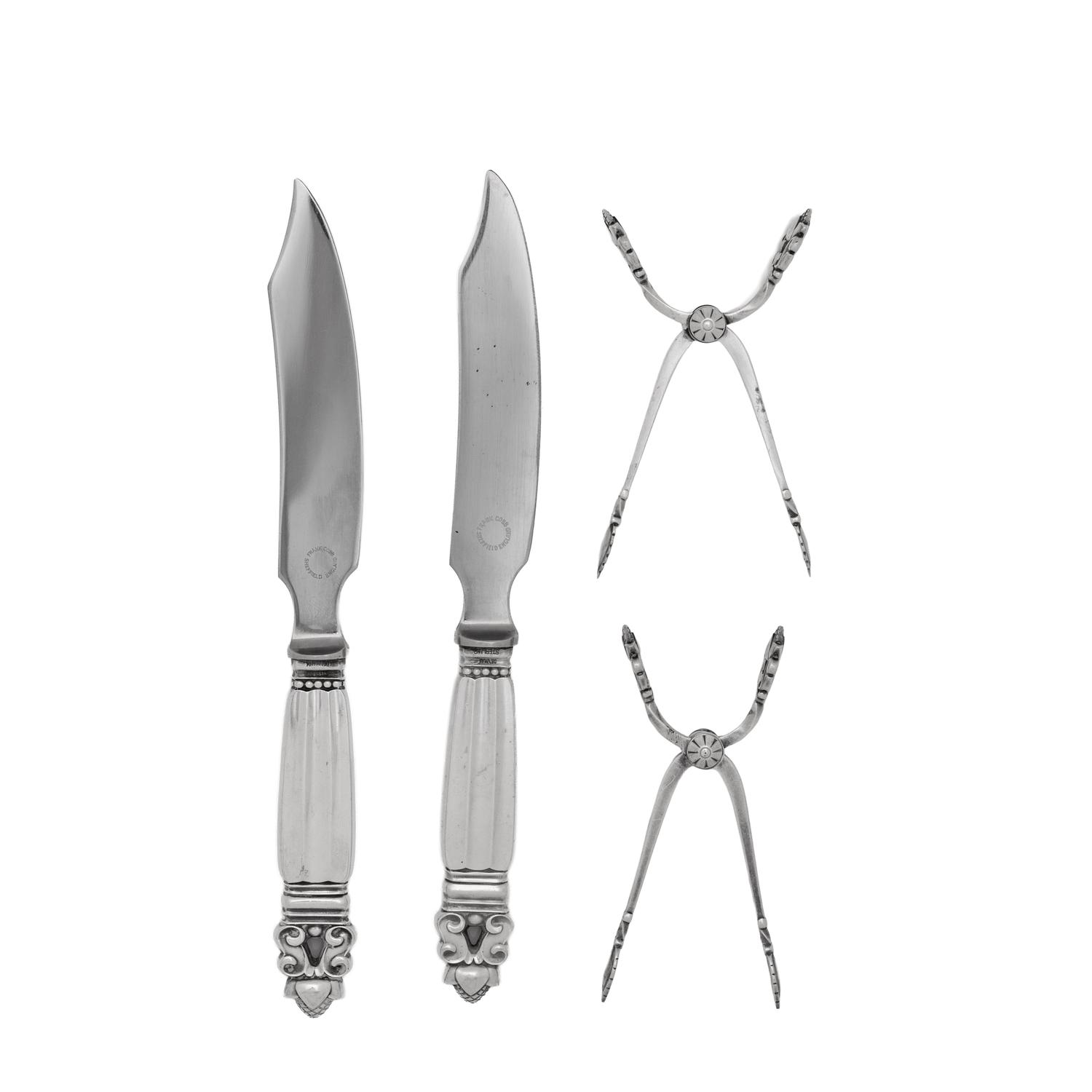A Pair of Georg Jensen Acorn Silver Cheese Knives and a Pair of Sugar Tongs