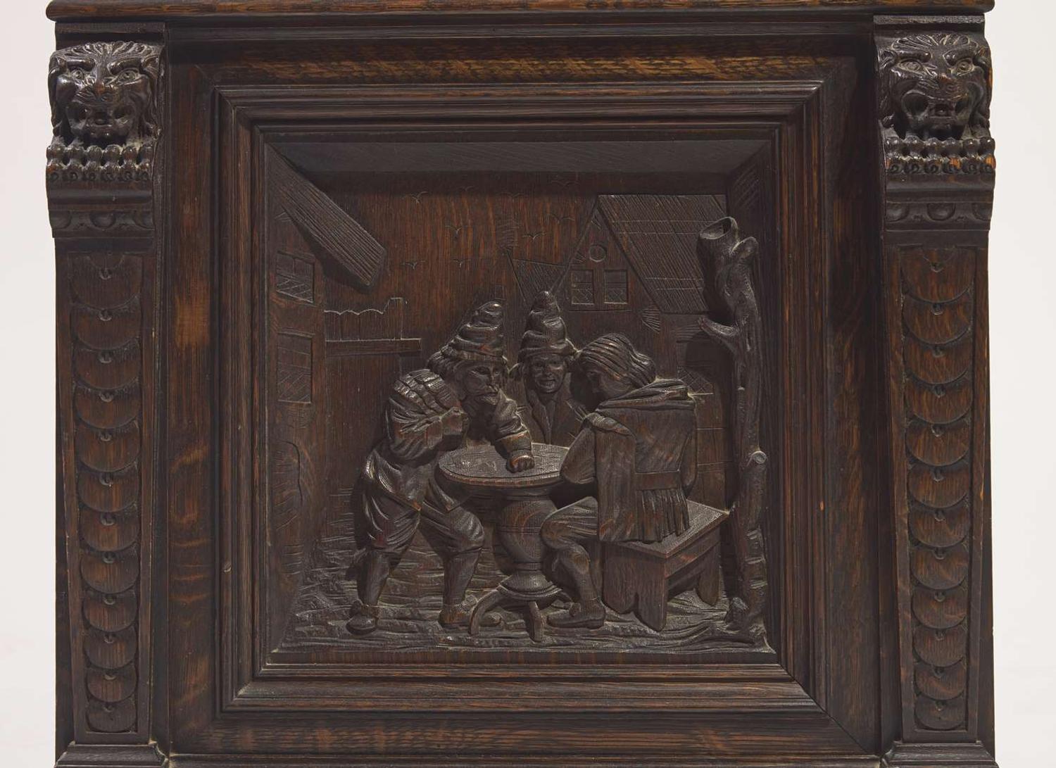An impressive Renaissance Revival carved oak tall case clock, the case attributed to R.J. Horner & Co., New York, NY, with works by Winterhalder & Hofmeier, Schwaerzenbach, Black Forest, Germany, retailed by Tilden Thurber Co., Providence, RI, late 19th / early 20th century