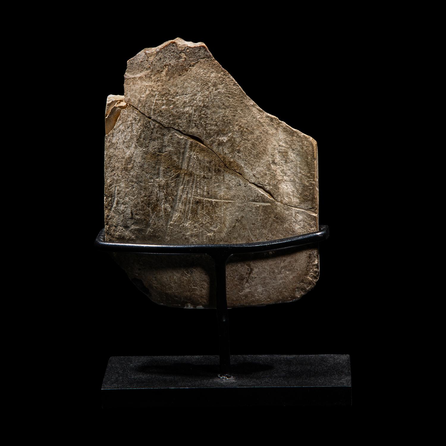 An Egyptian Limestone Stele Fragment with Hathor