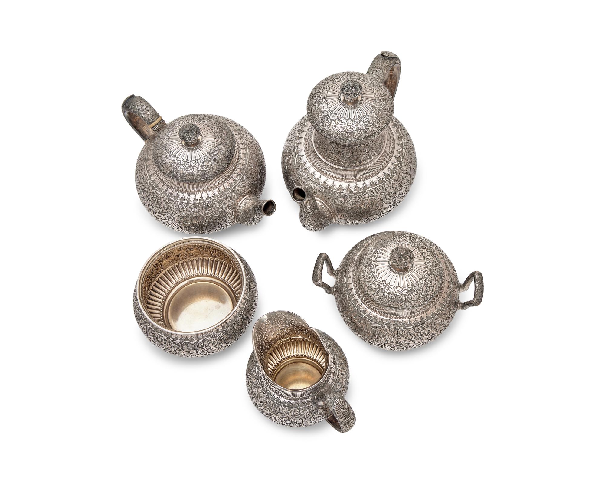 A Five-Piece Sterling Silver Coffee Service in the Persian Taste
