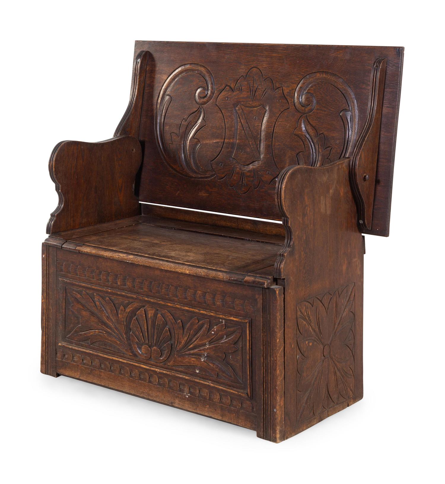 A Jacobean Style Carved Oak Metamorphic Monks Settle
