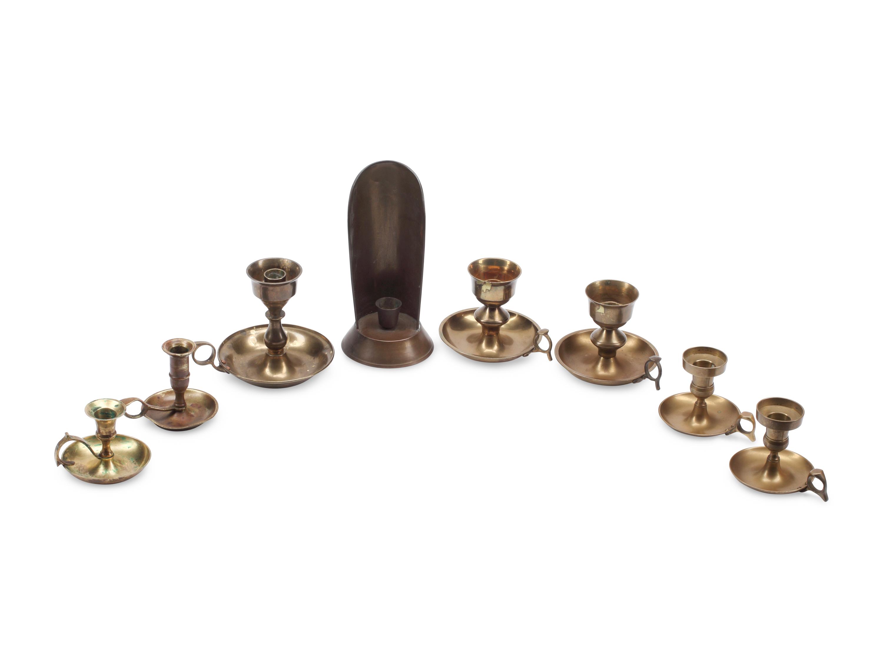 A Group of English Brass Candlesticks