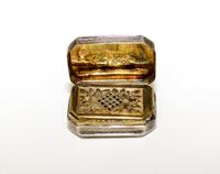 A George III Silver Vinaigrette, John Shaw, Birmingham, 1808, of rectangular form with canted corners, the lid and underside worked wit