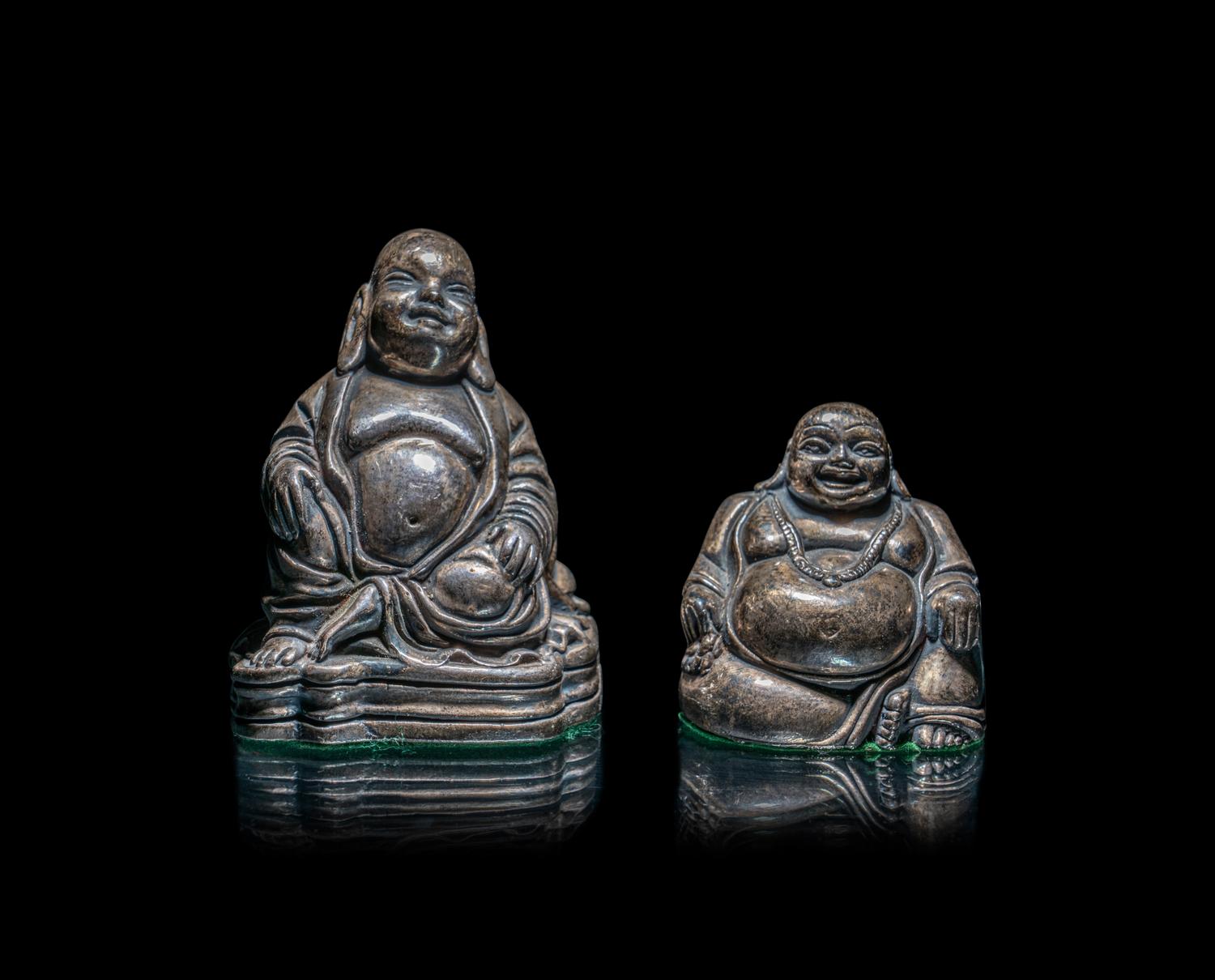 Two Silver Figures of Laughing Buddha