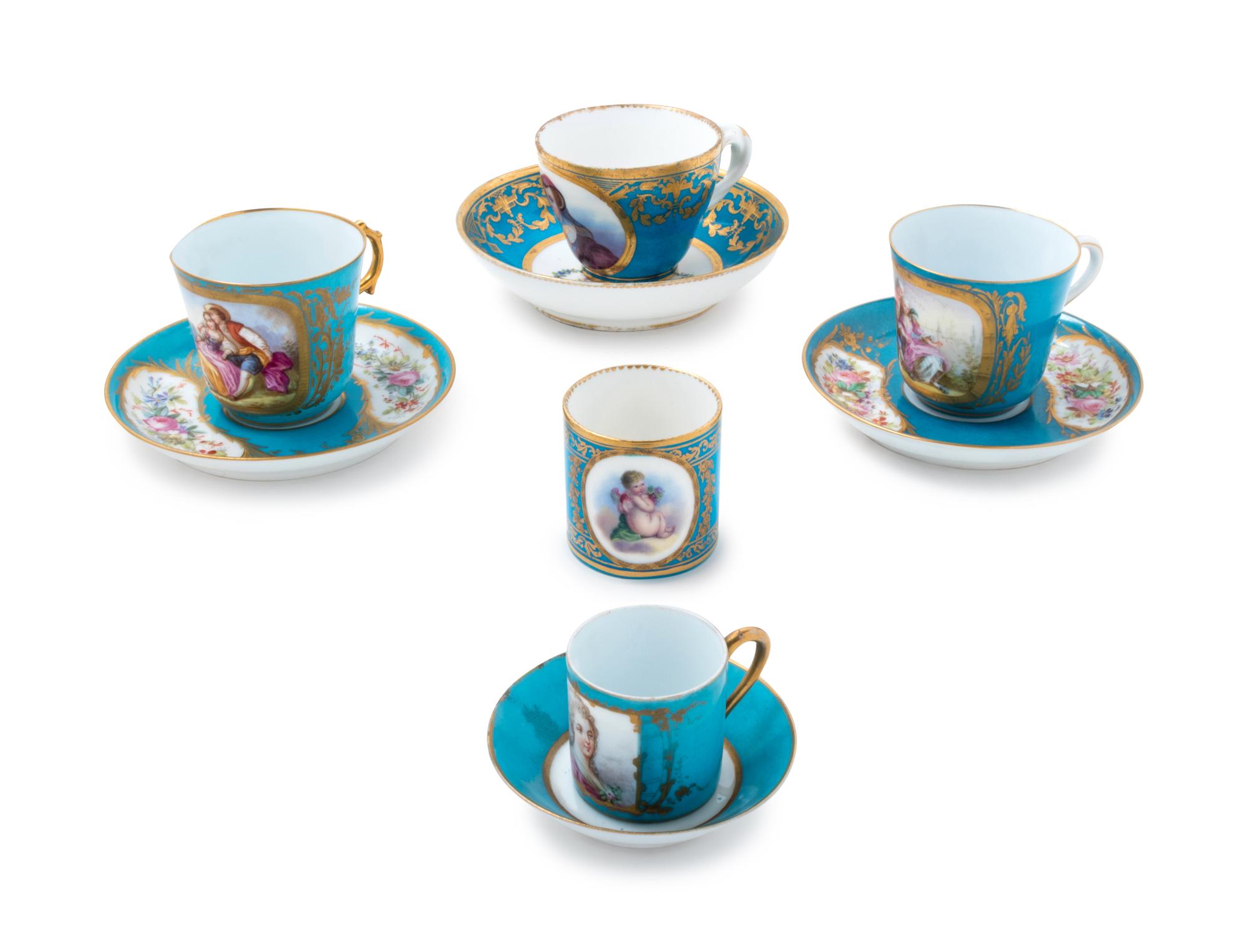 Four Sèvres Style Painted and Parcel Gilt Celeste Blue-Ground Porcelain Cups and Saucers