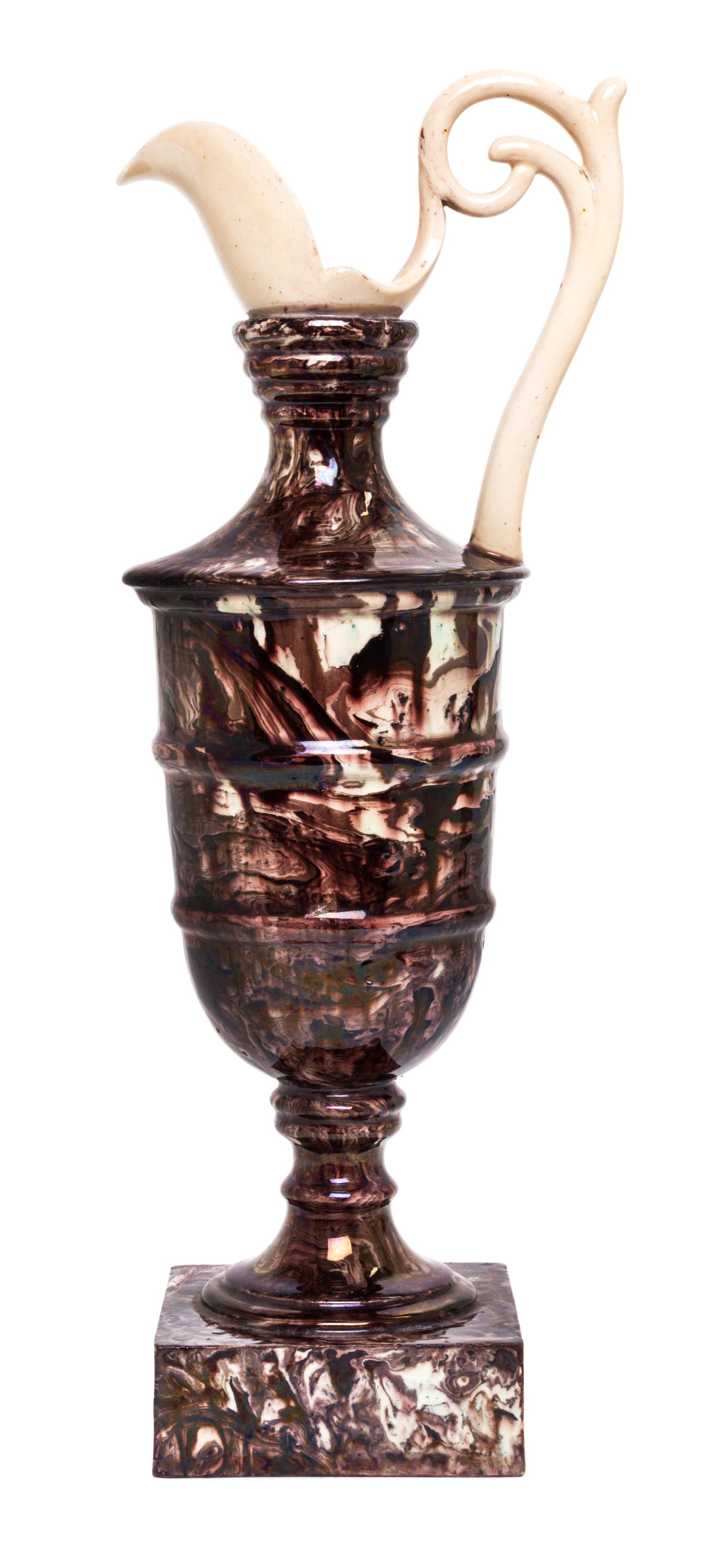 An English Ceramic Ewer Height 11 1/2 inches.