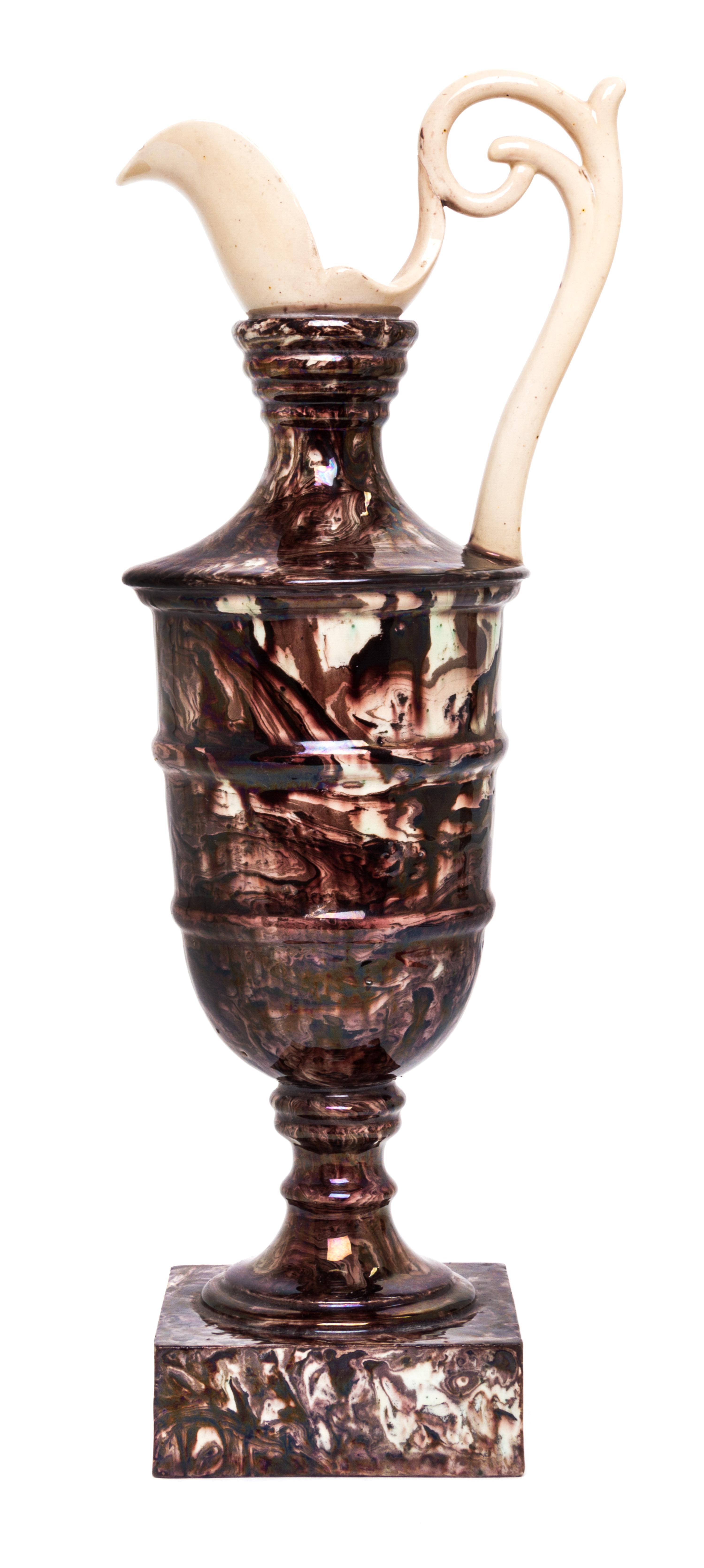 An English Ceramic Ewer Height 11 1/2 inches.