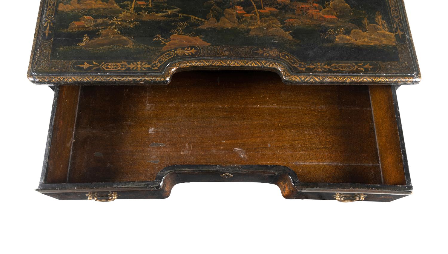 A Chinese Export Black and Gilt Lacquered Kneehole Desk