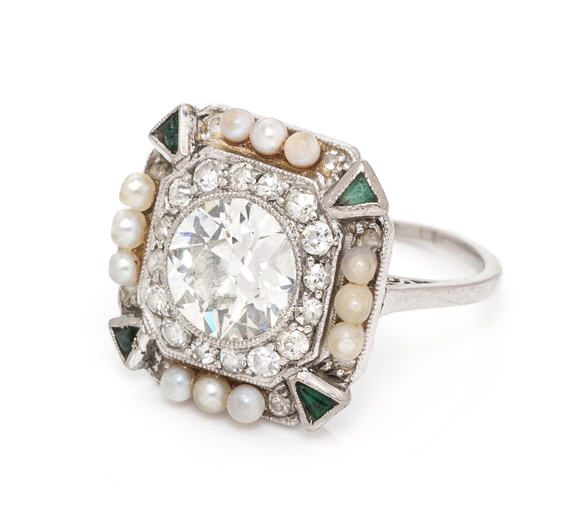 A Platinum, Diamond, Seed Pearl and Simulated Emerald Ring, 3.10 dwts.