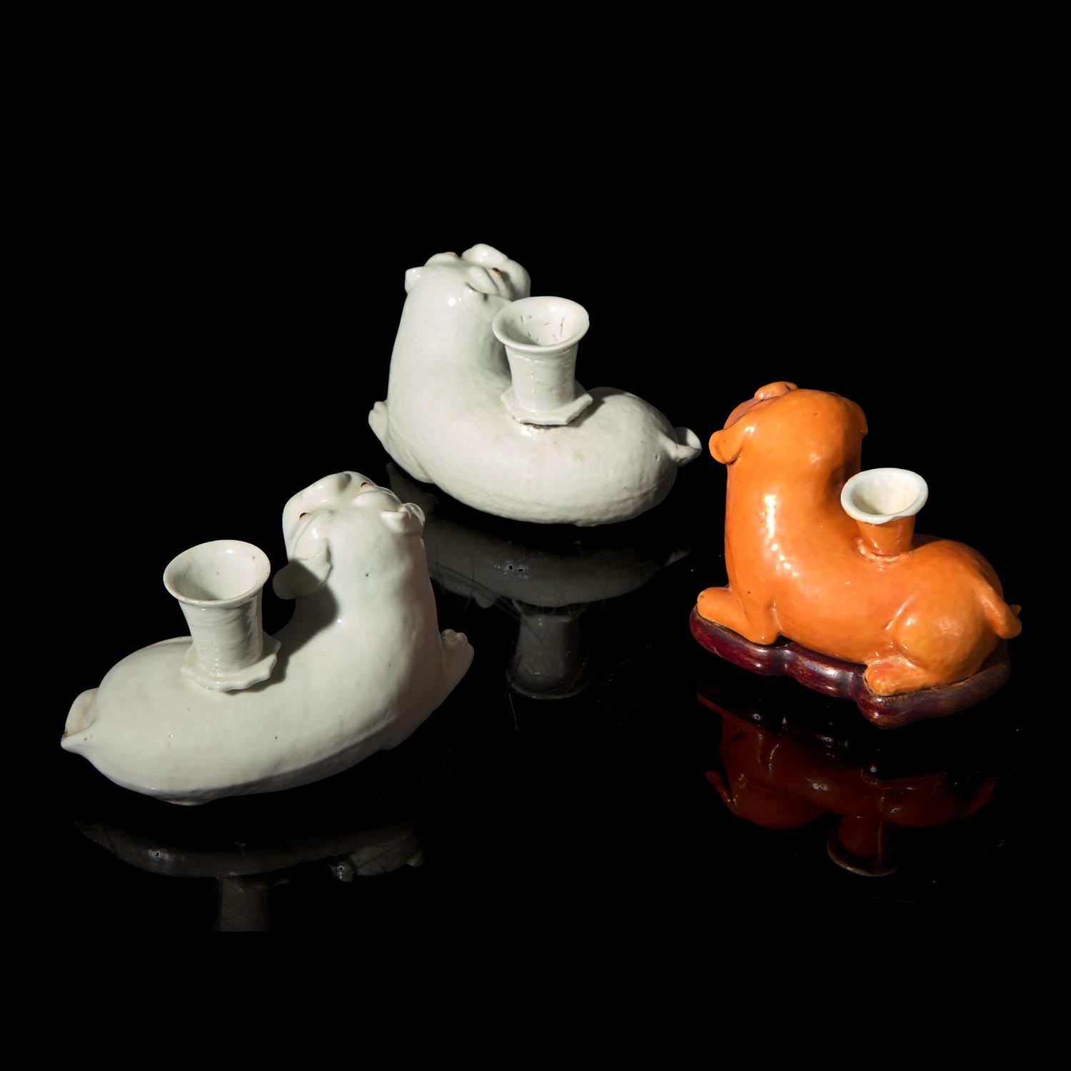 Three Chinese Export Porcelain Dog Candleholders, 19th Century 清晚期 外銷臥犬燭臺三件