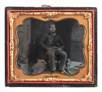 [EARLY PHOTOGRAPHY]. A trio of portraits featuring men with dogs, comprising: