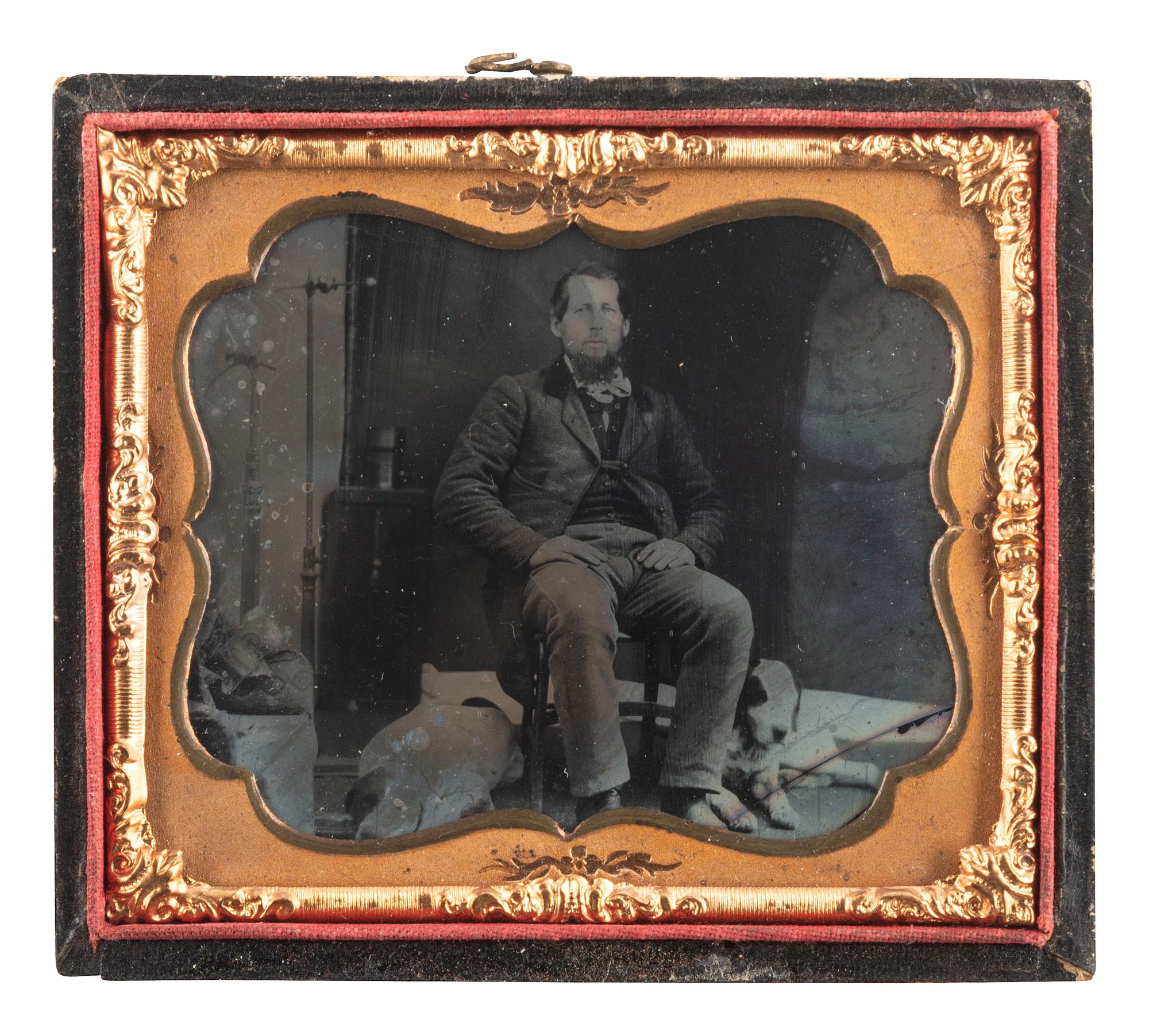 [EARLY PHOTOGRAPHY]. A trio of portraits featuring men with dogs, comprising: