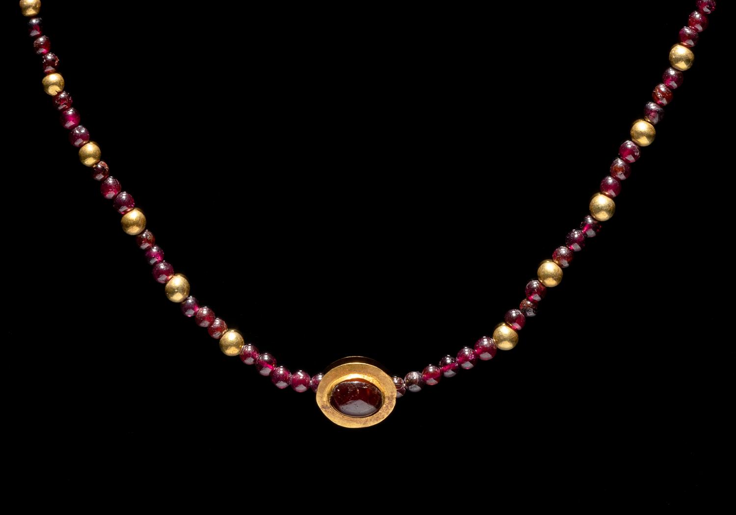 A Roman Gold and Garnet Bead Necklace