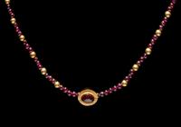 A Roman Gold and Garnet Bead Necklace