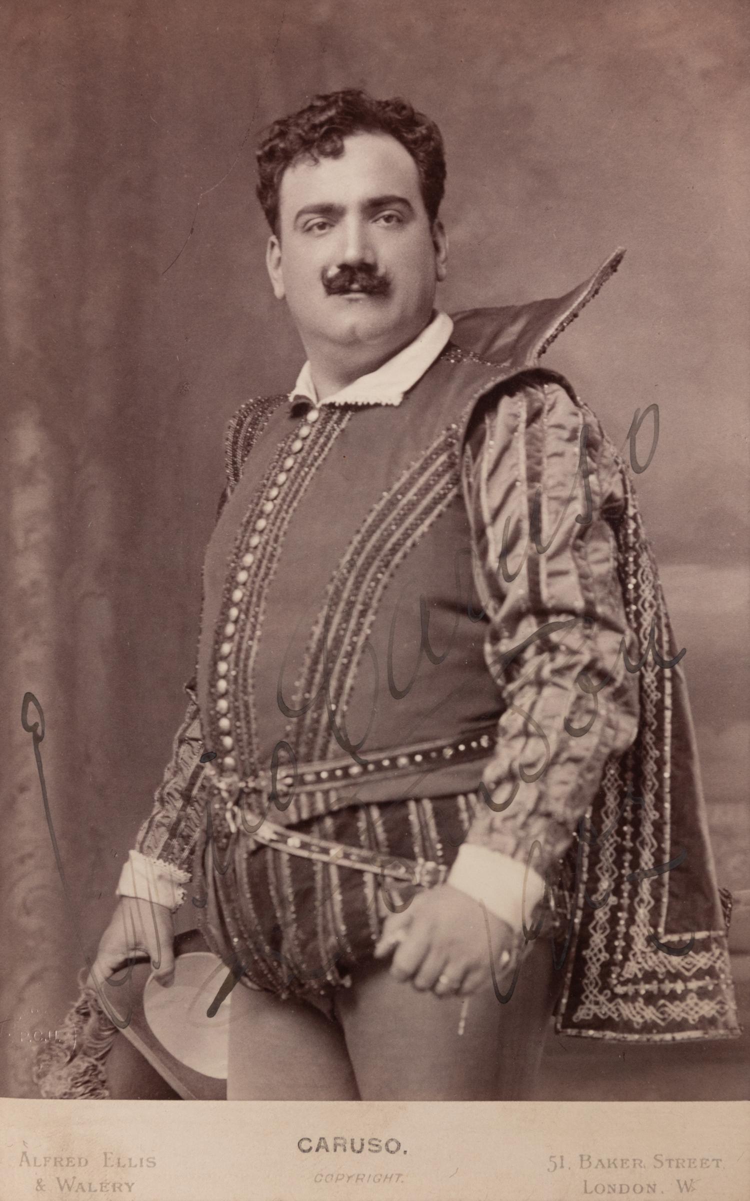 CARUSO, Enrico (1873-1921). Black and white promotional photograph signed ("Enrico Caruso London 1905?").