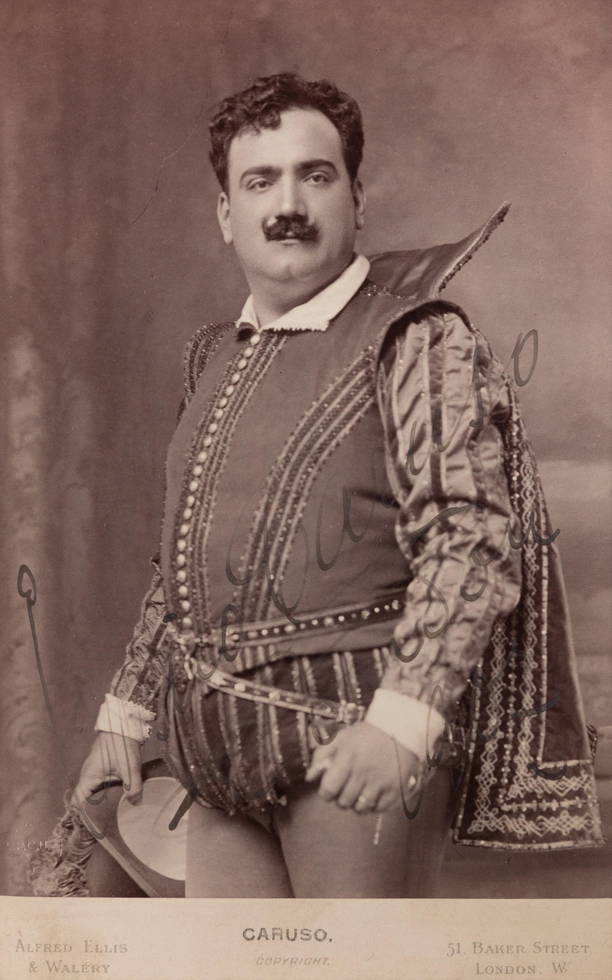 CARUSO, Enrico (1873-1921). Black and white promotional photograph signed ("Enrico Caruso London 1905?").
