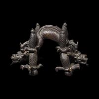 A Chinese Patinated Bronze Double Dragon Stand, Late Qing Dynasty 清晚期 青銅龍形座
