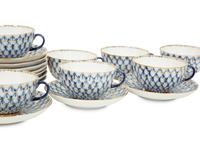 A Set of Twelve Lomonosov Cobalt Net Porcelain Teacups and Saucers