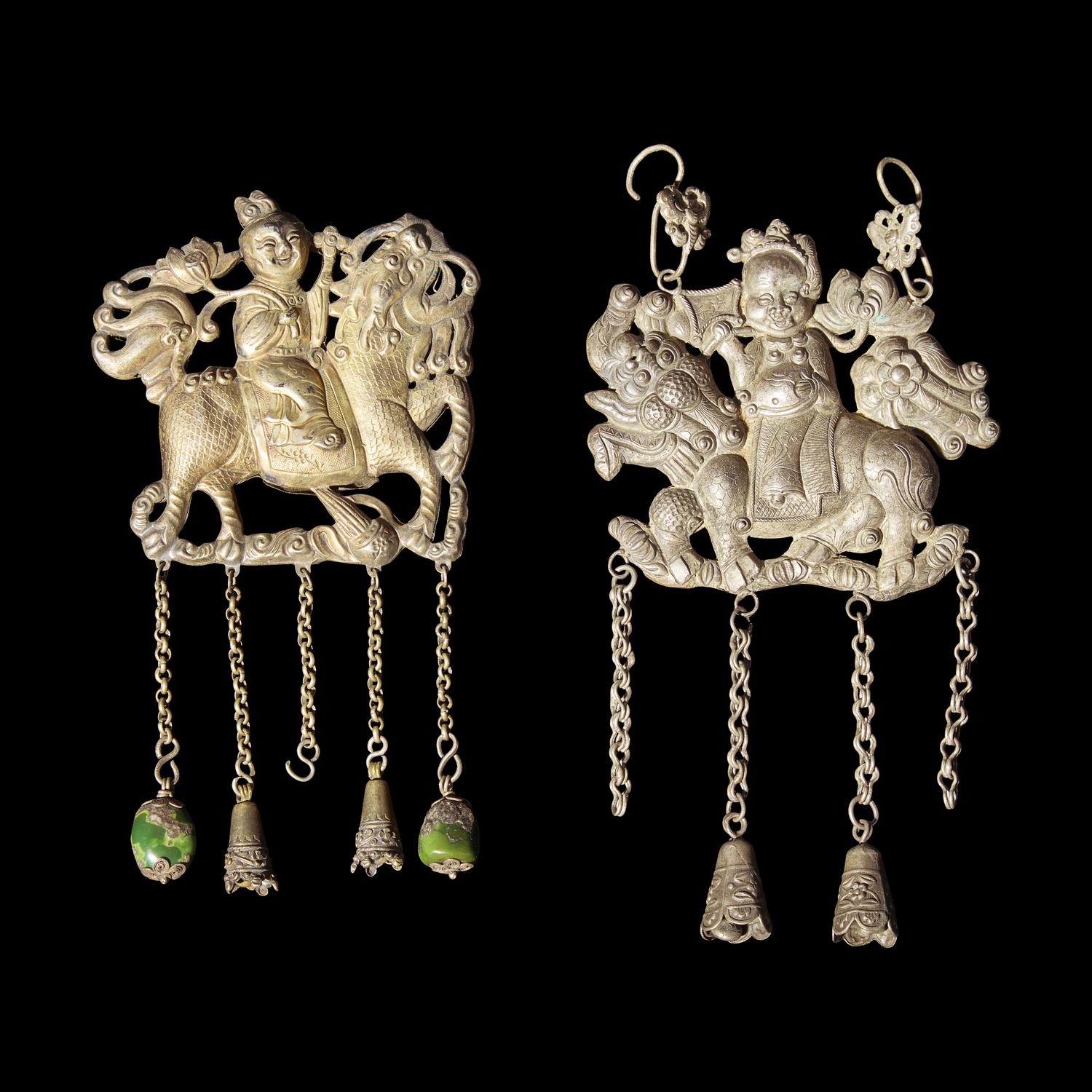 Eight Chinese Silver 'Boy and Qilin' Pendants, Late Qing Dynasty-Republic Period 晚清-民國 銀鍍金、銀燒藍及銀製麒麟送子長命鎖一組八件