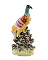 A Stafforshire Figure of a Bird — 19TH CENTURY