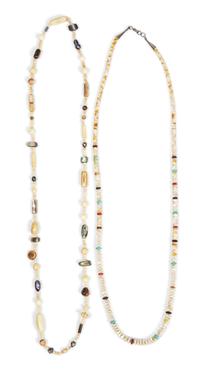 A Buffalo Fetish Necklace, Robert Kaniatobe (1936-1998) Length of the first 26 inches.