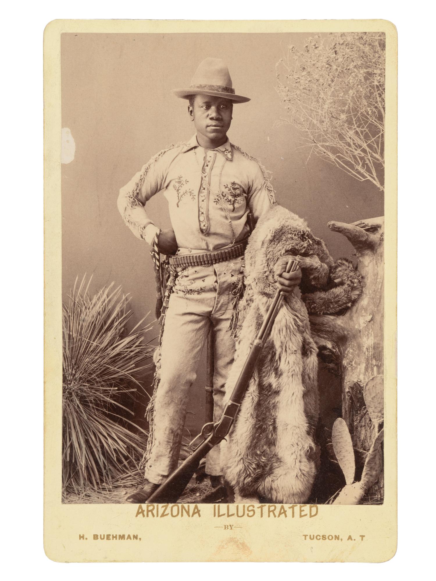 [WESTERN AMERICANA]. Cabinet Card of an African American Cowboy. Tucson, Arizona Territory: Buehman.