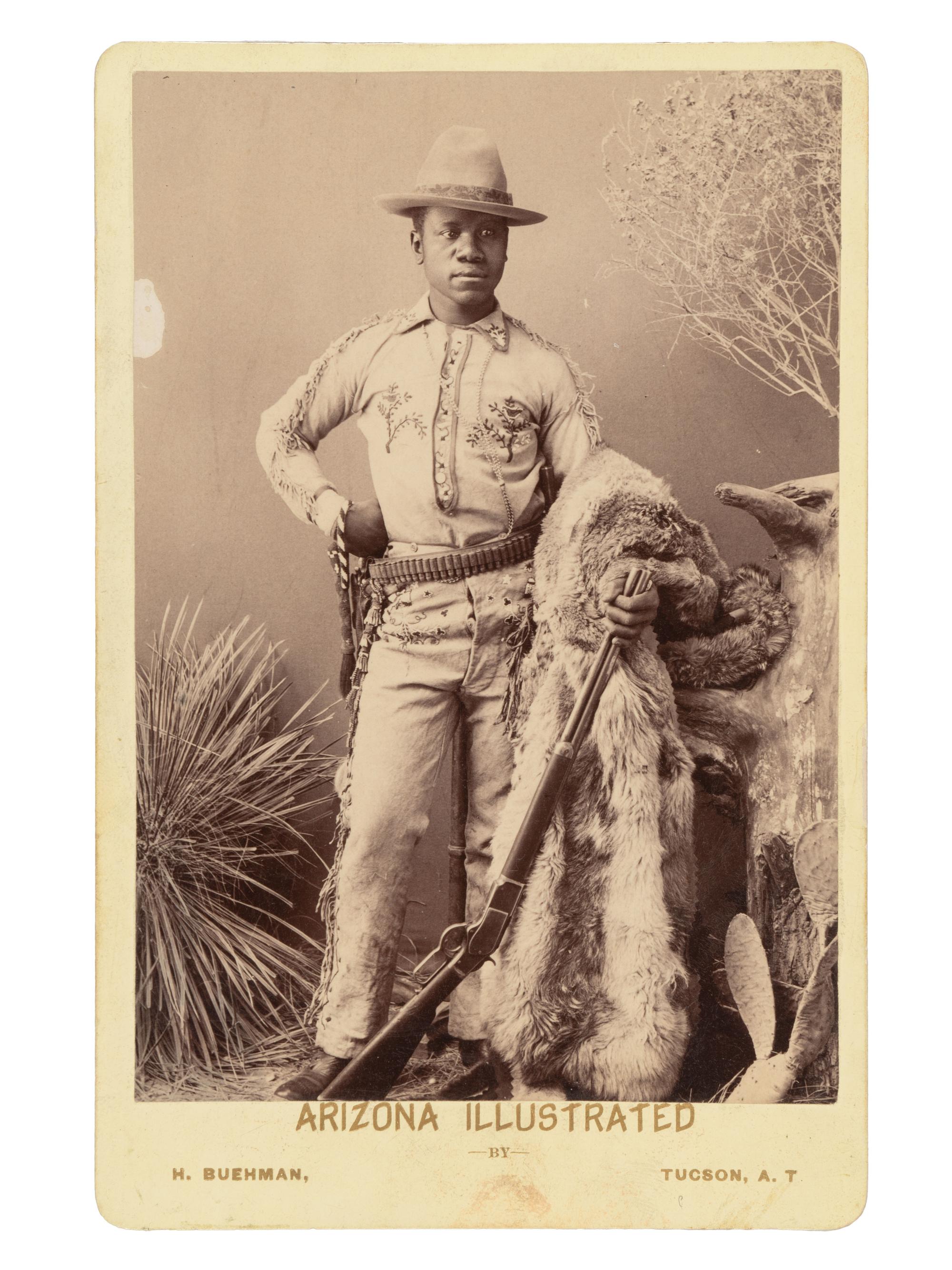 [WESTERN AMERICANA]. Cabinet Card of an African American Cowboy. Tucson, Arizona Territory: Buehman.