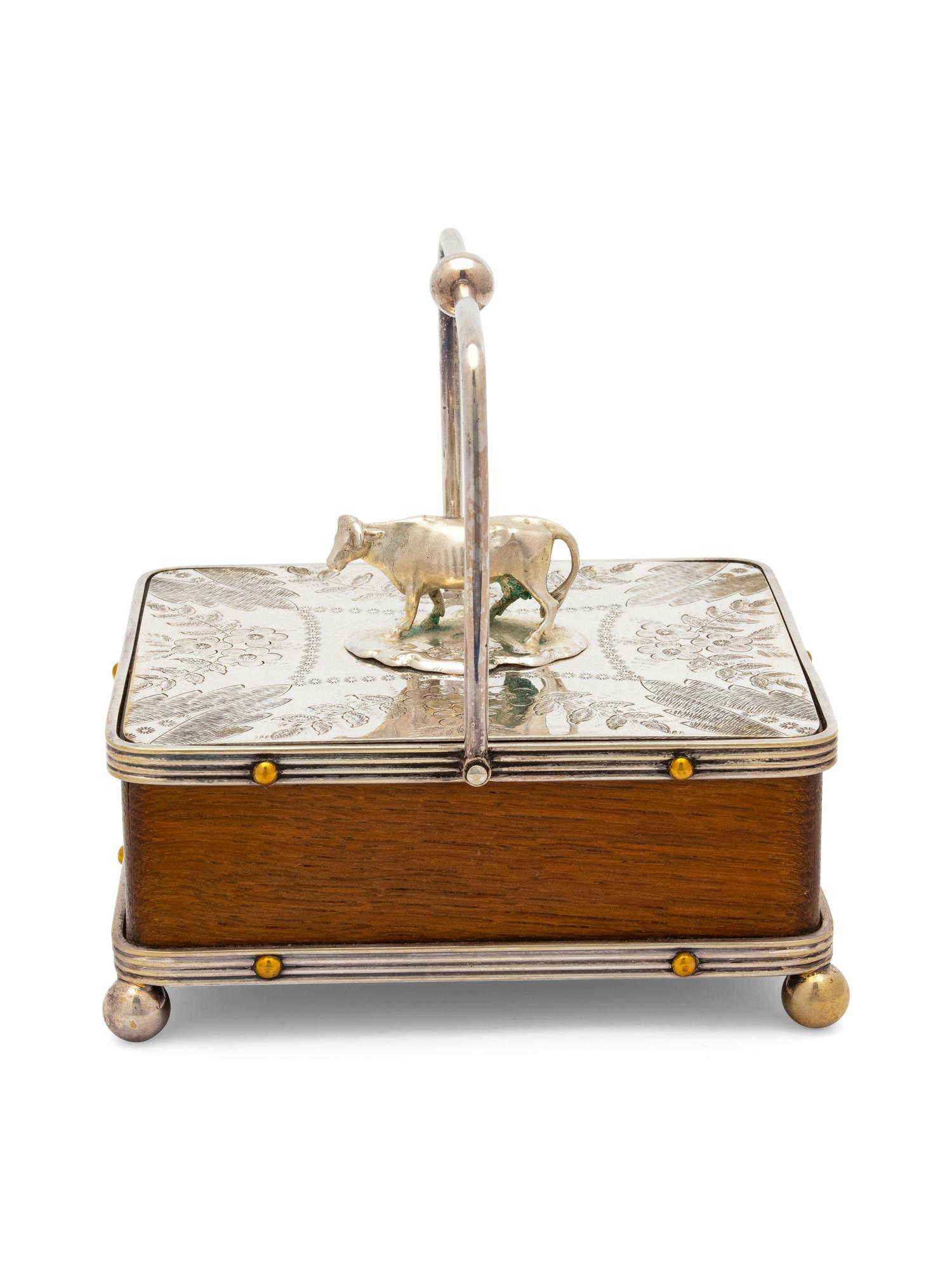 An English Silver Plate Mounted Oak Butter Server