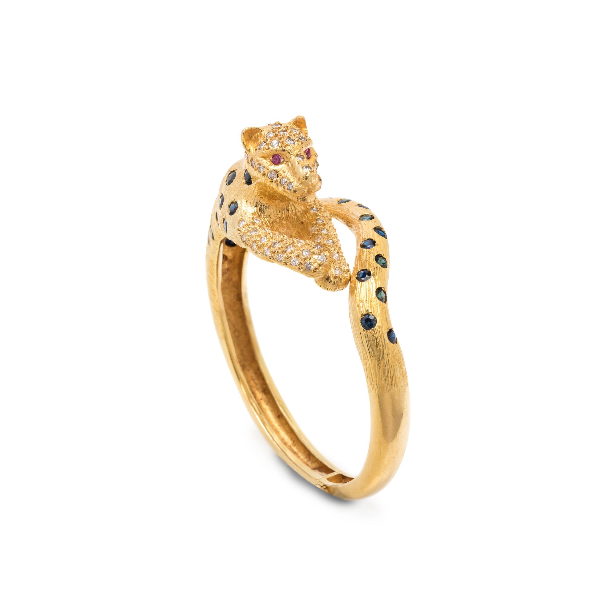 YELLOW GOLD, SAPPHIRE, DIAMOND AND RUBY LEOPARD BANGLE BRACELET