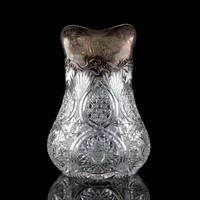 A Brilliant-Period Cut Glass Water Pitcher with Lilies of the Valley and a Silver Mount