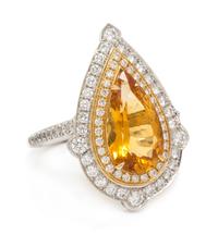 An 18 Karat Bicolor Gold, Citrine and Diamond Ring, 5.00 dwts.