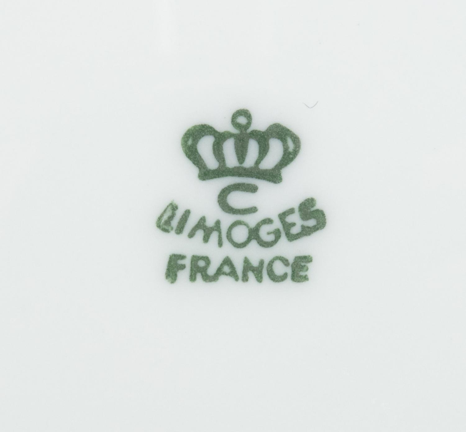 A Set of Six Limoges Porcelain Dessert Plates