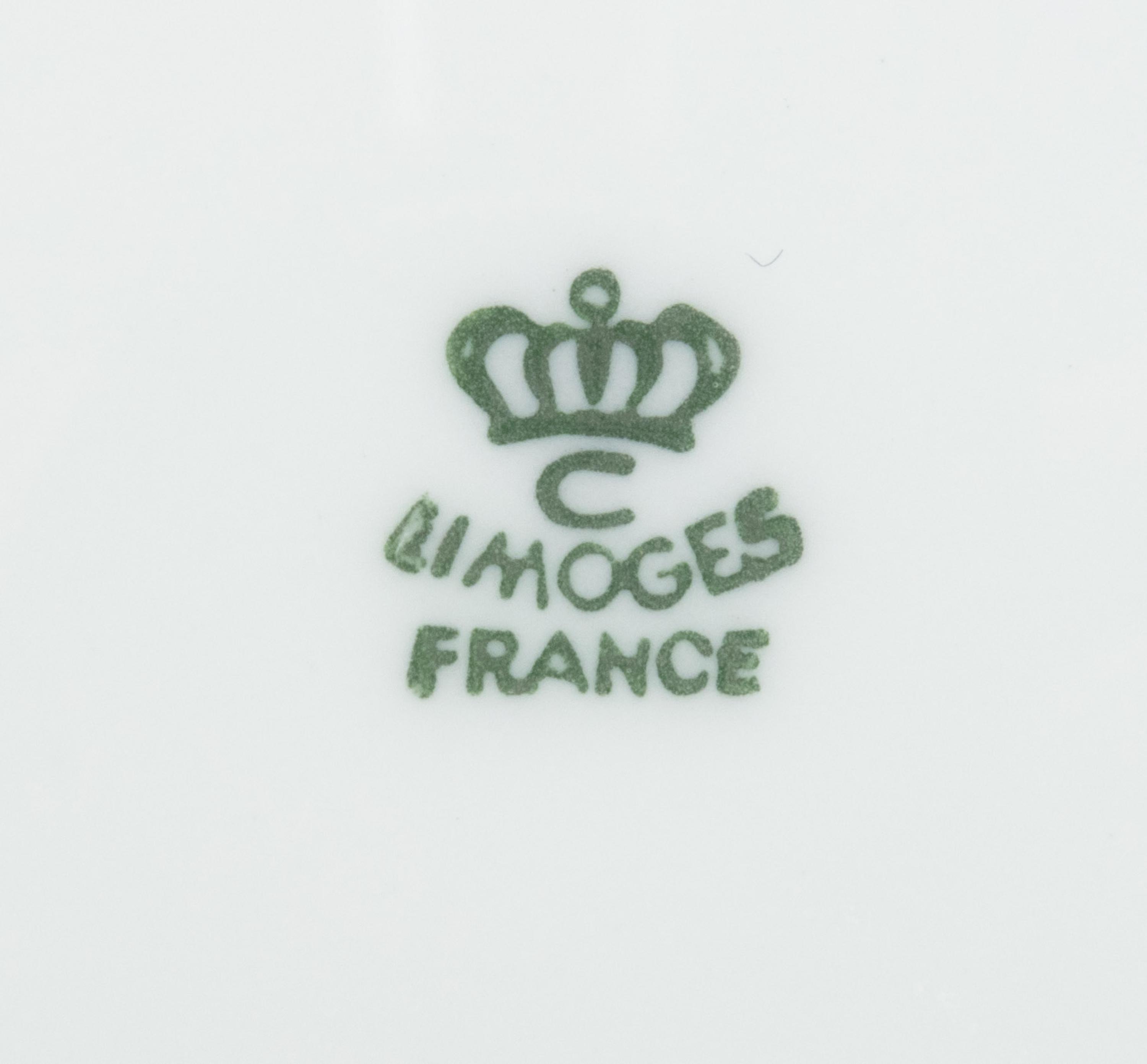 A Set of Six Limoges Porcelain Dessert Plates