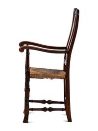 A Queen Anne Transitional Carved Maple Rush-Seat Spanish-Foot Armchair