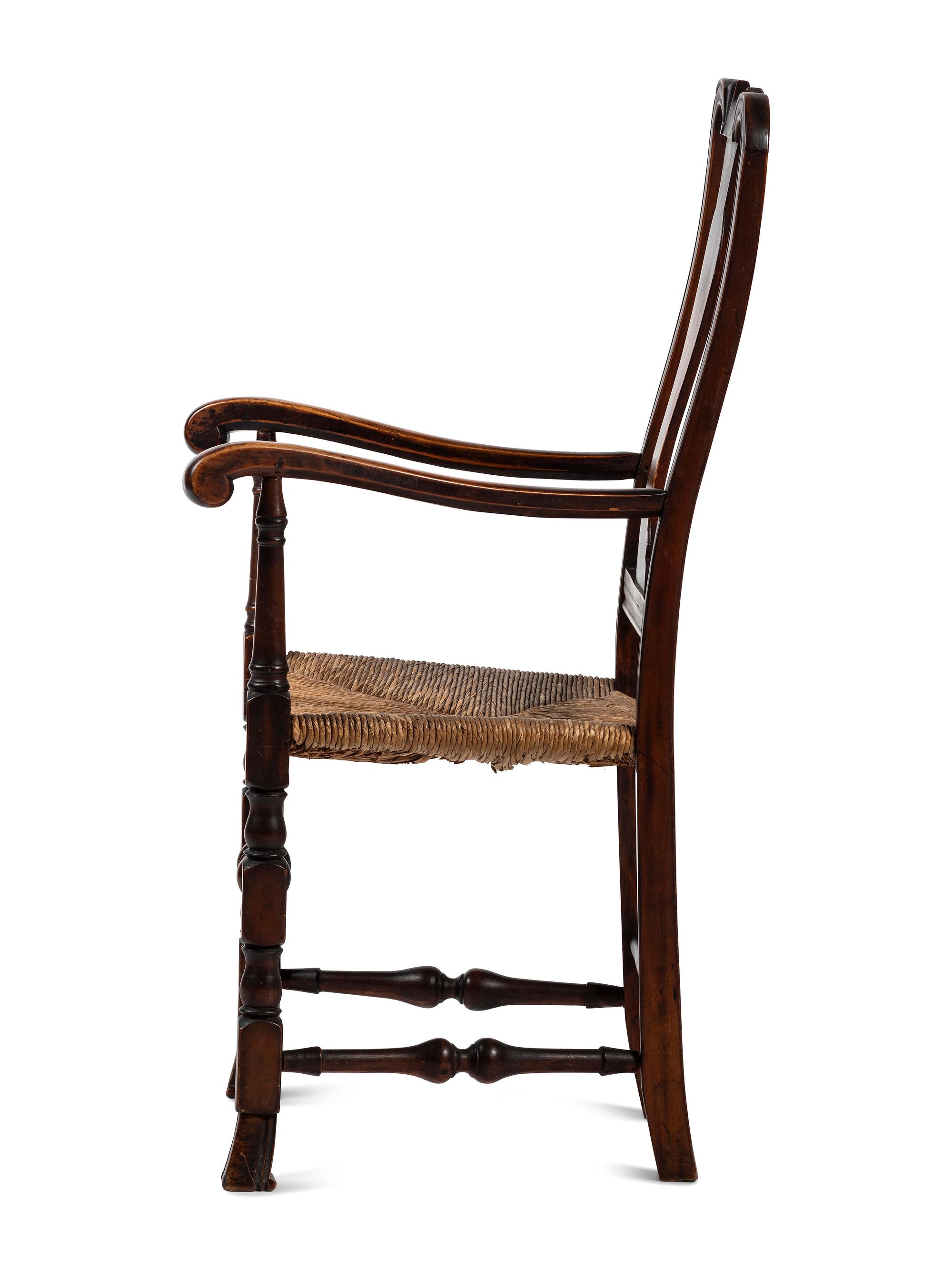A Queen Anne Transitional Carved Maple Rush-Seat Spanish-Foot Armchair