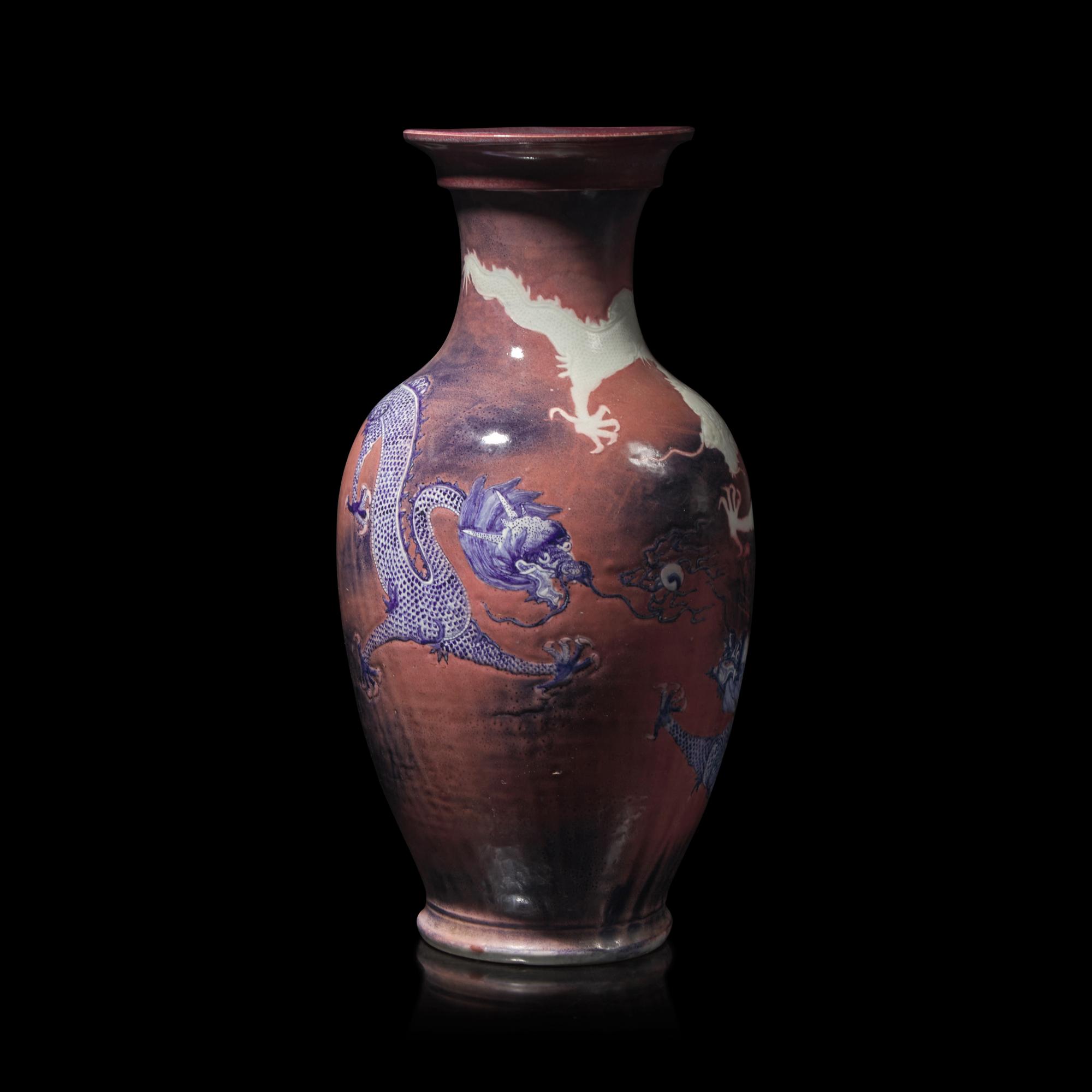 An Unusual and Large Carved Underglaze Blue and Copper Red "Dragons" Vase — 青花釉裡紅龍紋大瓶