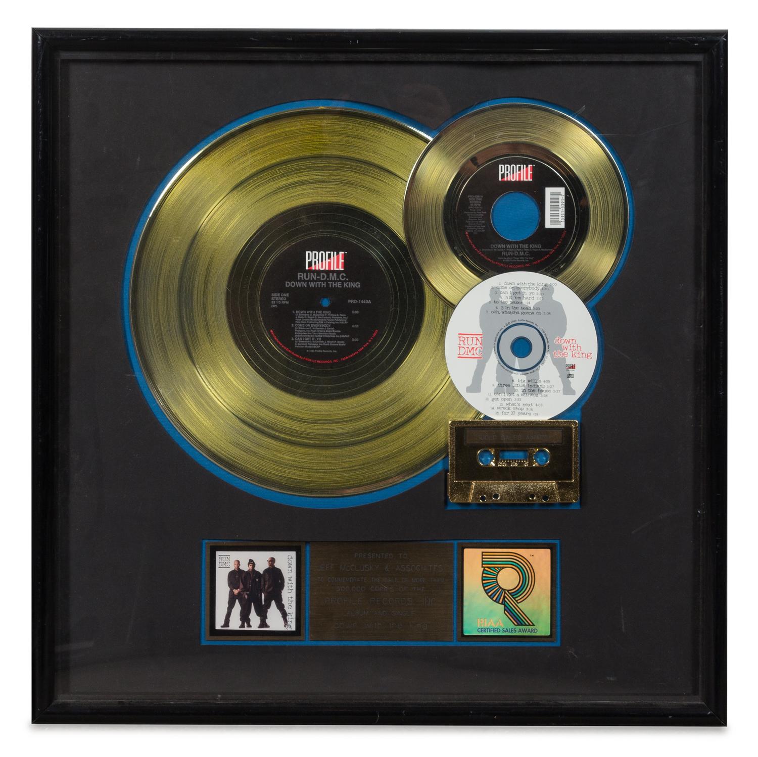 A Run-D.M.C.: Down with the King RIAA Certified Gold Presentation Album 21 x 21 inches.